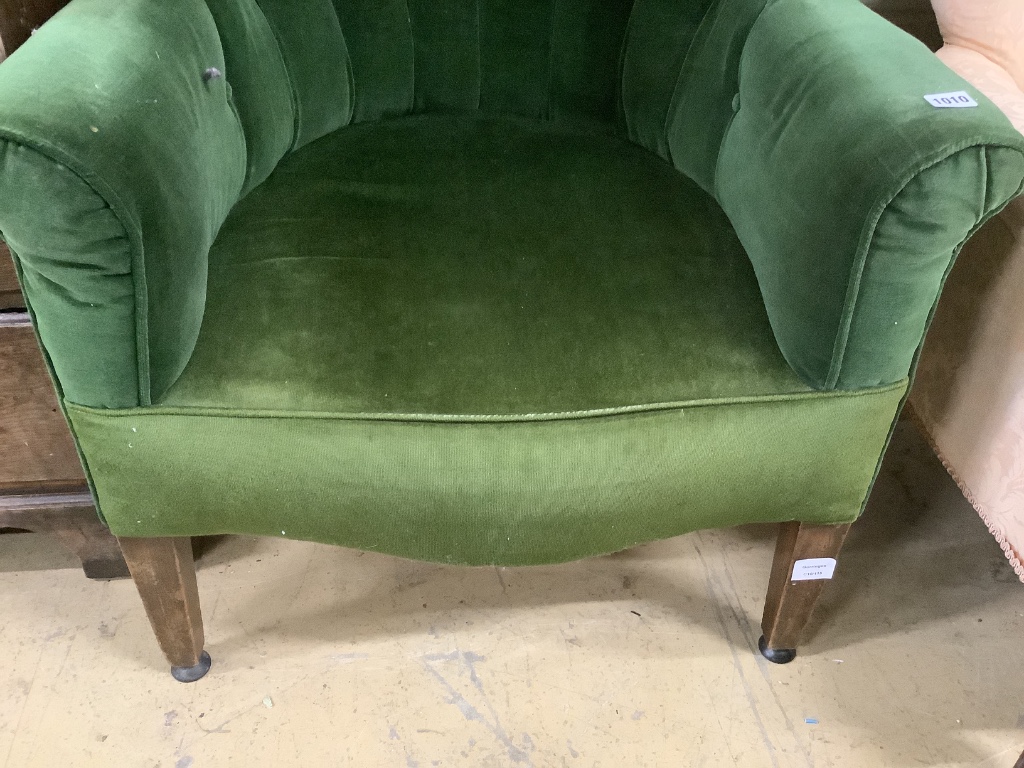 A George III mahogany wing armchair, on squared tapered legs, width 75cm